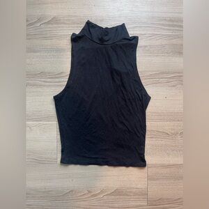 Turtleneck crop top with open sleeves